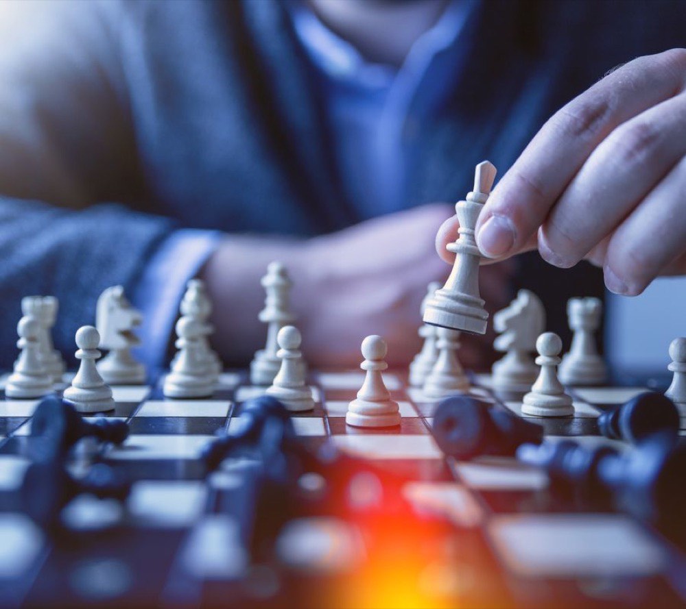 Close-up of a strategic chess move